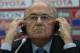 FIFA president Sepp Blatter listens to question of journalists during a news conference at the Club World Cup soccer tournament in Marrakech, Morocco, Thursday, Dec. 19, 2013. (AP Photo/Matthias Schrader)