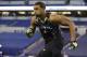 Louisville defensive lineman Marcus Smith runs a drill at the NFL football scouting combine in Indianapolis, Monday, Feb. 24, 2014. (AP Photo/Michael Conroy)