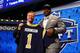 NEW YORK, NY - MAY 08: Greg Robinson of the Auburn Tigers poses with NFL Commissioner Roger Goodell after he was picked #2 overall by the during the first round of the 2014 NFL Draft at Radio City Music Hall on May 8, 2014 in New York City. (Photo by Elsa/Getty Images)