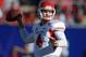 Dec 21, 2013; Las Vegas, NV, USA; Fresno State Bulldogs quarterback Derek Carr (4) throws a pass against the Southern California Trojans in the Las Vegas Bowl at Sam Boyd Stadium. Mandatory Credit: Kirby Lee-USA TODAY Sports