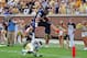 ATLANTA, GA - SEPTEMBER 15: Jake McGee #83 of the Virginia Cavaliers leaps over Jamal Golden #4 for a touchdown against the Georgia Tech Yellow Jackets at Bobby Dodd Stadium on September 15, 2012 in Atlanta, Georgia. (Photo by Scott Cunningham/Getty Images)