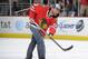 CHICAGO, IL - MARCH 21: WWE Champion CM Punk shoots the puck in between periods during the NHL game between the Vancouver Canucks and the Chicago Blackhawks on March 21, 2012 at the United Center in Chicago, Illinois. (Photo by Bill Smith/NHLI via Getty Images)