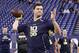 Feb 23, 2014; Indianapolis, IN, USA; Alabama Crimson Tide quarterback A.J. McCarron throws the ball during the 2014 NFL Combine at Lucas Oil Stadium. Mandatory Credit: Brian Spurlock-USA TODAY Sports