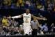 Wichita State's Cleanthony Early celebrates after hitting a shot during the second half of a third-round game against Kentucky of the NCAA college basketball tournament Sunday, March 23, 2014, in St. Louis. (AP Photo/Charlie Riedel)