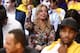 Los Angeles Lakers President Jeanie Buss dances in her seat to music as she attends the NBA basketball game between the Los Angeles Lakers and the Los Angeles Clippers during the second half in Los Angeles, Tuesday, Oct. 29, 2013. The Lakers won 116-103. (AP Photo/Danny Moloshok)