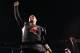 Fresno State's Derek Carr raises his fist to the crowd as he celebrates a Mountain West title in the second half of an NCAA college football game in Fresno, Calif., Saturday, Dec. 7, 2013. (AP Photo/Gary Kazanjian)