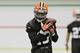 Cleveland Browns wide receiver Nate Burleson makes a catch during a voluntary minicamp workout at the team's NFL football training facility in Berea, Ohio, Tuesday, April 29, 2014. (AP Photo/Mark Duncan)