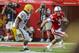 Nebraska quarterback Taylor Martinez (3) is pursued by Southern Mississippi defensive lineman Khyri Thornton (98) in the first half of an NCAA college football game in Lincoln, Neb., Saturday, Sept. 7, 2013. (AP Photo/Nati Harnik)