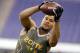 California tight end Richard Rodgers makes a catch as he runs a drill during the NFL football scouting combine in Indianapolis, Saturday, Feb. 22, 2014. (AP Photo/Michael Conroy)