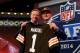 NEW YORK, NY - MAY 08: Johnny Manziel of the Texas A&M Aggies poses with NFL Commissioner Roger Goodell after he was picked #22 overall by the Cleveland Browns during the first round of the 2014 NFL Draft at Radio City Music Hall on May 8, 2014 in New York City. (Photo by Elsa/Getty Images)