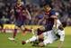 FC Barcelona's Alexis Sanchez, second right, duels for the ball against Elche's Alberto Botia during a Spanish La Liga soccer match at the Camp Nou stadium in Barcelona, Spain, Sunday, Jan 5, 2014. (AP Photo/Manu Fernandez)