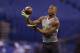 Utah State defensive back Nevin Lawson runs a drill at the NFL football scouting combine in Indianapolis, Tuesday, Feb. 25, 2014. (AP Photo/Michael Conroy)
