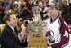 Colorado Avalanche goalie Patrick Roy is presented the Conn Smythe trophy as the most valuable player in the Stanley Cup playoffs by NHL commissioner Gary Bettman after they won the Stanley Cup with a 3-1 win over the New Jersey Devils in Denver on Saturday, June 9, 2001. (AP Photo/Fred Jewell)