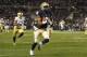 PITTSBURGH, PA - NOVEMBER 09: Devin Street #15 of the Pittsburgh Panthers breaks a tackle and scores a 63 yard touchdown in the second half against the Notre Dame Fighting Irish during the game on November 9, 2013 at Heinz Field in Pittsburgh, Pennsylvania. (Photo by Justin K. Aller/Getty Images)