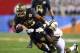 Jan 1, 2014; Glendale, AZ, USA; Baylor Bears running back Lache Seastrunk (25) runs the ball in the second quarter against the Central Florida Knights during the Fiesta Bowl at University of Phoenix Stadium. Mandatory Credit: Mark J. Rebilas-USA TODAY Sports