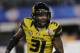 Missouri defensive back E.J. Gaines (31) warms up before an NCAA college football game against Oklahoma State, Friday, Jan. 3, 2014, in Arlington, Texas. (AP Photo/Tim Sharp)