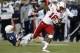 Nebraska wide receiver Quincy Enunwa (18) heads for the end zone after taking a pass from Nebraska quarterback Ron Kellogg III in the second-quarter of an NCAA college football game against Penn State in State College, Pa., Saturday, Nov. 23, 2013. (AP Photo/Gene J. Puskar)