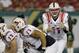 SMU quarterback Garrett Gilbert (11) calls a play against South Florida during the first quarter of an NCAA college football game Saturday, Nov. 23, 2013, in Tampa, Fla. (AP Photo/Chris O'Meara)