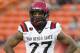 San Diego State defensive back Eric Pinkins (27) looks over to the sideline in the first quarter of an NCAA college football game Saturday, Nov. 16, 2013, in Honolulu. (AP Photo/Eugene Tanner)