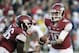 Arkansas quarterback Brandon Allen (10) hands off to fullback Kiero Small (36) in the first half of an NCAA college football game in Fayetteville, Ark., Saturday, Nov. 2, 2013. (AP Photo/Beth Hall)