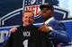NEW YORK, NY - MAY 08: Khalil Mack of the Buffalo Bulls poses with NFL Commissioner Roger Goodell after he was picked #5 overall by the Oakland Raiders during the first round of the 2014 NFL Draft at Radio City Music Hall on May 8, 2014 in New York City. (Photo by Elsa/Getty Images)