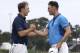 Jordan Spieth, left, and Martin Kaymer of Germany, shake hands at the end of the third round of The Players championship golf tournament at TPC Sawgrass, Saturday, May 10, 2014 in Ponte Vedra Beach, Fla. (AP Photo/Lynne Sladky)