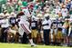 Sep 28, 2013; South Bend, IN, USA; Oklahoma Sooners linebacker Corey Nelson (7) makes an interception and runs it in for a touchdown against the Notre Dame Fighting Irish at Notre Dame Stadium. Mandatory Credit: Brian Spurlock-USA TODAY Sports