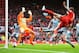 LIVERPOOL, ENGLAND - MAY 11: Daniel Agger of Liverpool (5) shoots past Tim Krul of Newcastle United to score their first goal during the Barclays Premier League match between Liverpool and Newcastle United at Anfield on May 11, 2014 in Liverpool, England. (Photo by Laurence Griffiths/Getty Images)