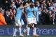 MANCHESTER, ENGLAND - MAY 11: Vincent Kompany of Manchester City is congratulated by his team-mates after scoring the second goal during the Barclays Premier League match between Manchester City and West Ham United at the Etihad Stadium on May 11, 2014 in Manchester, England. (Photo by Alex Livesey/Getty Images)