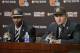 Cleveland Browns cornerback Justin Gilbert, left, from Oklahoma State, and quarterback Johnny Manziel, from Texas A&M in their inaugural news conference at the NFL football team's facility in Berea, Ohio Friday, May 9, 2014. Gilbert was the eighth overall pick in the draft Thursday night and Manziel 22nd. (AP Photo/Mark Duncan)