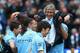 MANCHESTER, ENGLAND - MAY 11: The Manchester City Manager Manuel Pellegrini is lifted up by the players to throw him in the air at the end of the Barclays Premier League match between Manchester City and West Ham United at the Etihad Stadium on May 11, 2014 in Manchester, England. (Photo by Alex Livesey/Getty Images)