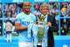 MANCHESTER, ENGLAND - MAY 11: The Manchester City Manager Manuel Pellegrini and Vincent Kompany pose with the trophy at the end of the Barclays Premier League match between Manchester City and West Ham United at the Etihad Stadium on May 11, 2014 in Manchester, England. (Photo by Alex Livesey/Getty Images)