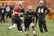 Cleveland Browns running back Dion Lewis runs the ball during a voluntary minicamp workout at the NFL football team's facility in Berea, Ohio Thursday, May 1, 2014. (AP Photo/Mark Duncan)