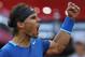 Rafael Nadal from Spain celebrates a point during a Madrid Open tennis tournament final match against Kei Nishikori from Japan in Madrid, Spain, Sunday, May 11, 2014. (AP Photo/Andres Kudacki)