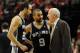 PORTLAND, OR - MAY 10: Gregg Popovich of the San Antonio Spurs speaks with Manu Ginobili #20 and Tony Parker #9 of the San Antonio Spurs in the second half of Game Three of the Western Conference Semifinals against the Portland Trail Blazers during the 2014 NBA Playoffs at the Moda Center on May 10, 2014 in Portland, Oregon. The Spurs won the game 118-103. NOTE TO USER: User expressly acknowledges and agrees that, by downloading and or using this photograph, User is consenting to the terms and conditions of the Getty Images License Agreement. (Photo by Steve Dykes/Getty Images)