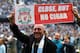 MANCHESTER, ENGLAND - MAY 11: A Manchester City fan shows off a banner mocking Liverpool at the end of the Barclays Premier League match between Manchester City and West Ham United at the Etihad Stadium on May 11, 2014 in Manchester, England. (Photo by Alex Livesey/Getty Images)