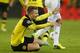 Dortmund's Marco Reus reacts during the Champions League quarterfinal second leg soccer match between Borussia Dortmund and Real Madrid in the Signal Iduna stadium in Dortmund, Germany, Tuesday, April 8, 2014. (AP Photo/Frank Augstein)