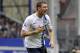 Manchester City's Edin Dzeko celebrates after scoring the second goal of the game during their English Premier League soccer match against Everton at Goodison Park in Liverpool, England, Saturday May 3, 2014. (AP Photo/Clint Hughes)