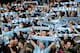 Supporters celebrate after Manchester City is crowned Premier League Champions during the English Premier League soccer match between Manchester City and West Ham United at the Etihad Stadium, Manchester, England, Sunday, May 11, 2014. (AP Photo/Rui Vieira)