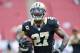 TAMPA, FL - SEPTEMBER 15: Safety Malcolm Jenkins #27 of the New Orleans Saints warms up for play against the Tampa Bay Buccaneers September 15, 2013 at Raymond James Stadium in Tampa, Florida. The Saints won 16 - 14. (Photo by Al Messerschmidt/Getty Images)