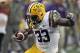 LSU running back Jeremy Hill (33) carries the ball during the second quarter of the NCAA college football game against Iowa Wednesday, Jan. 1, 2014, in Tampa, Fla. Hill, the game's most valuable player, scored two touchdowns in LSU's 21-14 win. (AP Photo/Chris O'Meara)