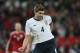 England's Steven Gerrard passes the ball during the international friendly soccer match between England and Denmark at Wembley stadium in London Wednesday, March 5, 2014. (AP Photo/Alastair Grant)