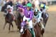 LOUISVILLE, KY - MAY 03: Jockey Victor Espinoza celebrates atop of California Chrome #5 after crossing the finish line to win the 140th running of the Kentucky Derby at Churchill Downs on May 3, 2014 in Louisville, Kentucky. (Photo by Matthew Stockman/Getty Images)