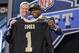 Oregon State wide receiver Brandon Cooks poses with NFL commissioner Roger Goodell after being selected by the New Orleans Saints as the 20th pick the first round of the 2014 NFL Draft, Thursday, May 8, 2014, in New York. (AP Photo/Craig Ruttle)