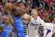 Oklahoma City Thunder forward Kevin Durant, left, passes the ball as Los Angeles Clippers forward Blake Griffin, center, and guard Chris Paul defend in the first half of Game 3 of the Western Conference semifinal NBA basketball playoff series, Friday, May 9, 2014, in Los Angeles. (AP Photo/Mark J. Terrill)