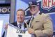 Michigan outside tackle Taylor Lewan poses for photos with NFL commissioner Roger Goodell after being selected by the Tennessee Titans as the eleventh pick in the the first round of the 2014 NFL Draft, Thursday, May 8, 2014, in New York. (AP Photo/Craig Ruttle)