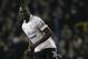 Tottenham Hotspur's Ledley King passes the ball as his side play Newcastle United during their English Premier League soccer match at Tottenham's White Hart Lane stadium in London, Saturday, Feb. 11, 2012. (AP Photo/Alastair Grant)