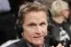 TNT commentator and former Chicago Bulls and San Antonio Spurs guard Steve Kerr broadcasts courtside for Game 4 of an NBA basketball first-round playoff series between the Toronto Raptors and the Brooklyn Nets, Sunday, April 27, 2014, in New York. Kerr said Sunday he spoke with New York Knicks President Phil Jackson twice over the weekend and that they will continue discussing his potential of becoming coach of the team. (AP Photo/Kathy Willens)