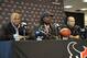 Houston Texans general manager Rick Smith, left, and coach Bill O'Brien, right, introduce their No. 1 overall NFL draft pick defensive end Jadeveon Clowney at a press conference Friday, May 9, 2014, in Houston. (AP Photo/Pat Sullivan)