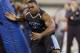 Princeton defensive lineman Caraun Reid runs a drill at the NFL football scouting combine in Indianapolis, Monday, Feb. 24, 2014. (AP Photo/Michael Conroy)